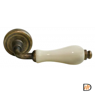 Ручка дверная CERAMICA CC-3 OBA/CHAMP раздельная на круглой розетке, цвет античная бронза/шампань, латунь