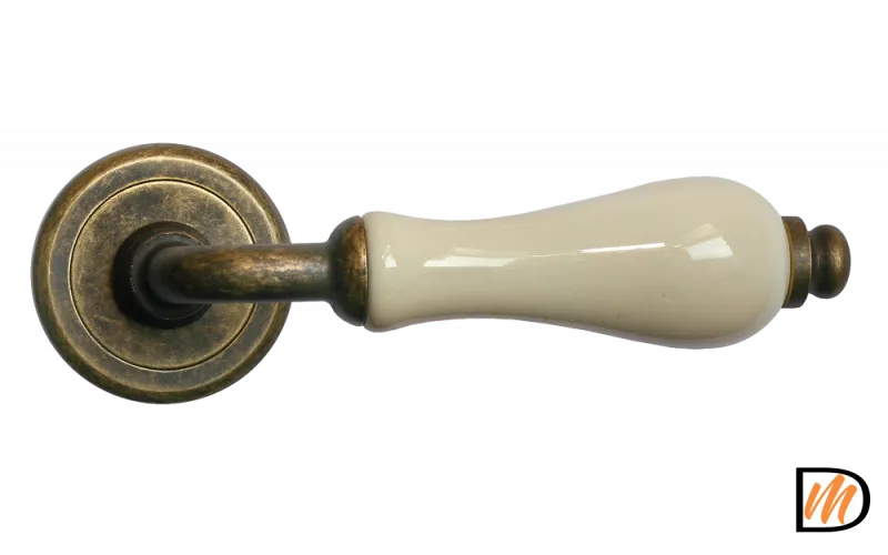 Ручка дверная CERAMICA CC-3 OBA/CHAMP раздельная на круглой розетке, цвет античная бронза/шампань, латунь